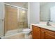 Bathroom featuring a walk-in shower, vanity with storage, and neutral finishes at 13933 Wildcat Dr, Carmel, IN 46033