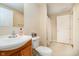 Bright bathroom featuring a single sink vanity and a tub-shower combo at 13933 Wildcat Dr, Carmel, IN 46033
