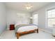 Serene bedroom with natural light, a ceiling fan, and neutral decor at 13933 Wildcat Dr, Carmel, IN 46033