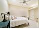 Cozy bedroom featuring a ceiling fan and plush pillows at 13933 Wildcat Dr, Carmel, IN 46033
