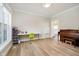 Bright office space featuring natural light, wood floors, and modern decor at 13933 Wildcat Dr, Carmel, IN 46033