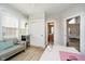 Bright office space with a cozy sofa and lots of natural light from many windows at 13933 Wildcat Dr, Carmel, IN 46033
