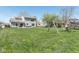 Large backyard with a patio, lawn, and a swing set, providing a great space for Gathering enjoyment and outdoor play at 13971 Bruddy Dr, Fishers, IN 46038