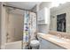 Cozy bathroom featuring a shower-tub combo and a neutral-toned vanity with ample storage at 13971 Bruddy Dr, Fishers, IN 46038