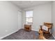 Bedroom featuring a neutral color scheme and a natural light-filled window at 13971 Bruddy Dr, Fishers, IN 46038
