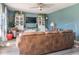 Relaxing living room featuring tasteful decor, built-in shelving, and ample natural light at 13971 Bruddy Dr, Fishers, IN 46038