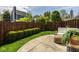 Backyard patio with partial view of seating area and perimeter landscaping at 15037 Rutherford Dr, Westfield, IN 46074