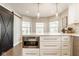 Stylish kitchen with a large island, stainless steel appliances, white cabinetry, and modern pendant lighting at 15037 Rutherford Dr, Westfield, IN 46074