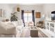 Bright living room features an area rug, modern furnishings, and natural light at 15037 Rutherford Dr, Westfield, IN 46074