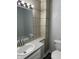Bathroom featuring modern fixtures, tiled walls, and a clean, updated design at 1517 N Gladstone Ave, Indianapolis, IN 46201