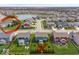 An aerial view shows the property location with a community pool, landscaping, and the neighborhood at 15723 Myland Dr, Noblesville, IN 46062