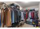 Walk-in closet featuring metal shelving and hanging rods with storage for clothes and shoes at 15723 Myland Dr, Noblesville, IN 46062