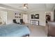 Relaxing main bedroom features tray ceiling, plush carpet, and ample space with easy access to bathroom and closet at 15723 Myland Dr, Noblesville, IN 46062