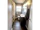 Well-lit bathroom featuring a modern vanity and a shower/tub combination with a decorative curtain at 1624 N Whittier Pl, Indianapolis, IN 46218