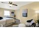 Serene bedroom with a plush bed, soft lighting, and neutral color scheme at 1629 N K St, Elwood, IN 46036