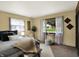Bright bedroom with a large window, comfortable bed, and stylish accents at 1629 N K St, Elwood, IN 46036
