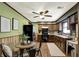 Charming eat-in kitchen with warm wood cabinetry, modern appliances, and stylish decor at 1629 N K St, Elwood, IN 46036