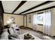 Bright living room featuring natural light, neutral decor, and stylish furnishings at 1629 N K St, Elwood, IN 46036