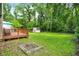 Backyard featuring deck, shed and plenty of green space at 1697 Stacy Lynn Dr, Indianapolis, IN 46231
