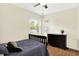 Bright bedroom with a bed, dresser, hardwood floors, and a window offering natural light at 1697 Stacy Lynn Dr, Indianapolis, IN 46231