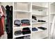 Walk-in closet featuring organized shelving and ample storage space at 1697 Stacy Lynn Dr, Indianapolis, IN 46231