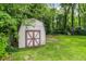 Shed with painted doors in a large back yard at 1697 Stacy Lynn Dr, Indianapolis, IN 46231