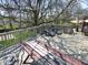 Spacious deck area with comfortable lounge chairs and a dining table, great for outdoor relaxation and entertaining at 1737 Friendship Dr, Indianapolis, IN 46217