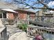 Outdoor deck featuring comfortable seating and a dining area, perfect for relaxing and enjoying the view of the yard at 1737 Friendship Dr, Indianapolis, IN 46217