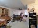 Finished basement offers a cozy living space with comfortable seating, exercise equipment, and built-in cabinets for storage at 1737 Friendship Dr, Indianapolis, IN 46217