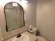 Bathroom with a marble vanity and a shower with a glass door at 1737 Friendship Dr, Indianapolis, IN 46217