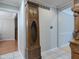 Entryway featuring neutral paint, tile flooring, and an antique grandfather clock, adding character to the home's interior at 1737 Friendship Dr, Indianapolis, IN 46217