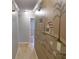 Hallway with wood floors and a mural on the wall, leading to other rooms in the home at 1737 Friendship Dr, Indianapolis, IN 46217