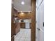 Functional kitchen with bright cabinets and white tile flooring at 1737 Friendship Dr, Indianapolis, IN 46217