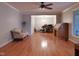 Spacious living room with hardwood floors, ceiling fan, and comfortable seating at 1737 Friendship Dr, Indianapolis, IN 46217