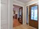Welcoming living room with hardwood floors that flow into adjoining room at 1737 Friendship Dr, Indianapolis, IN 46217