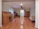 Open-concept living room with hardwood floors and neutral wall paint at 1737 Friendship Dr, Indianapolis, IN 46217