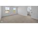 The room is carpeted and has an open doorway that leads into the bathroom at 2252 Marjorie Way, Shelbyville, IN 46176