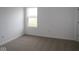 Bedroom with neutral carpeting, a window for natural light, and a closet at 2252 Marjorie Way, Shelbyville, IN 46176