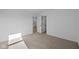 Bedroom with neutral carpet, white walls and open doors at 2252 Marjorie Way, Shelbyville, IN 46176