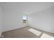 Bright bedroom with neutral carpet, large window and minimalist design at 2252 Marjorie Way, Shelbyville, IN 46176