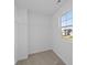 This walk in closet is carpeted and contains a shelving unit at 2252 Marjorie Way, Shelbyville, IN 46176