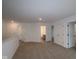 Carpeted upstairs hallway featuring all white trim, neutral paint, and multiple doors at 2252 Marjorie Way, Shelbyville, IN 46176