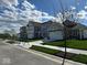 New homes feature sidewalks and grassy yards in a well-planned community at 2252 Marjorie Way, Shelbyville, IN 46176