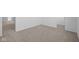 An open bedroom features neutral carpet, white walls, and natural lighting throughout at 2268 Marjorie Way, Shelbyville, IN 46176