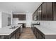 The gourmet kitchen boasts stainless steel appliances, gas range, an island, and plenty of cabinet space at 2268 Marjorie Way, Shelbyville, IN 46176