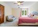 Bedroom featuring cozy seating area, lots of natural light and soft carpet at 244 W Admiral S Way, Carmel, IN 46032