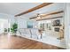 Spacious living room with hardwood floors, a modern fireplace, and ample natural light at 244 W Admiral S Way, Carmel, IN 46032