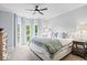 Bedroom with large bay window letting in natural light and view to the green outdoors at 244 W Admiral S Way, Carmel, IN 46032