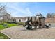 Community playground area with modern equipment, set against a backdrop of beautiful homes at 244 W Admiral S Way, Carmel, IN 46032