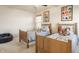 Bright bedroom with two twin beds, playful 'Toy Story' themed decor, and natural light at 2548 Ruffian Dr, Westfield, IN 46074